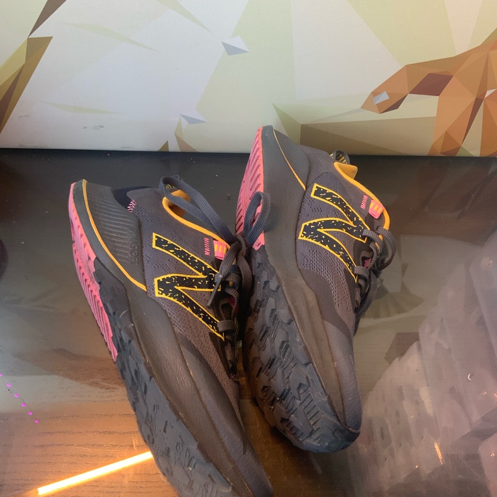 New Balance Black and Pink Trail Sneakers
